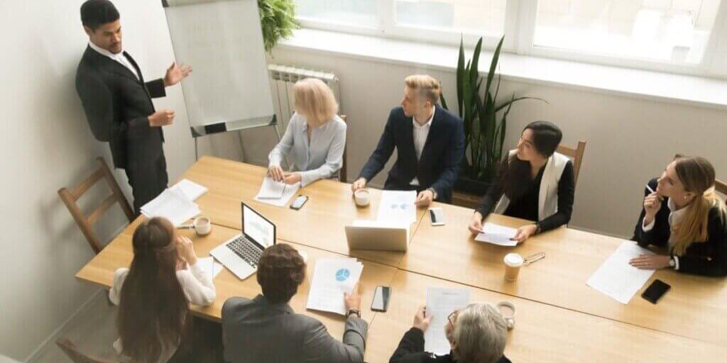 african-american-ceo-giving-presentation-corporate-team-meeting-concept