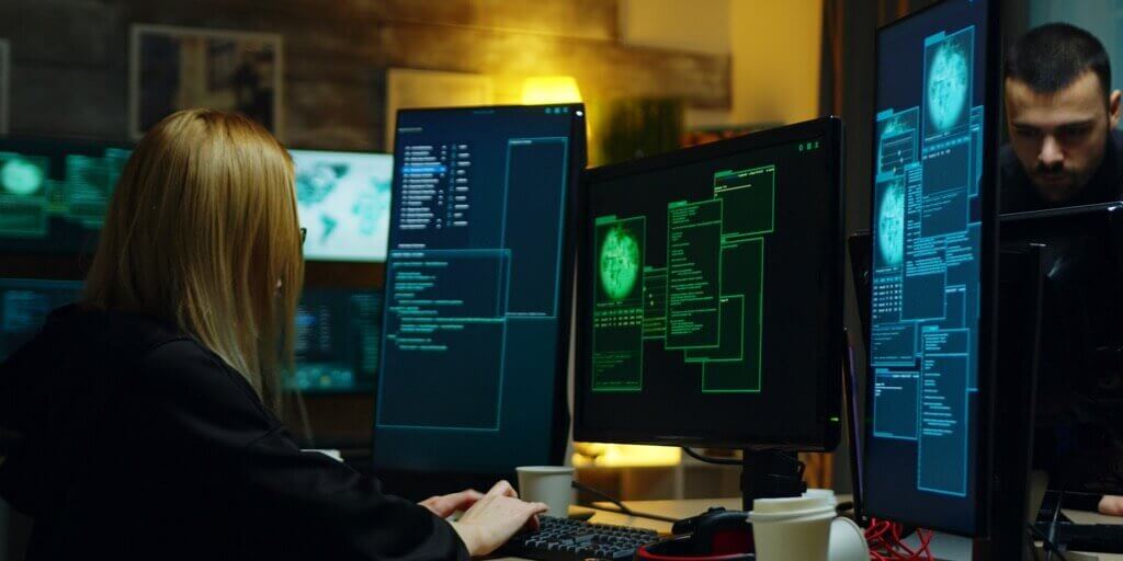 beautiful-hacker-girl-working-with-another-dangerous-cyber-criminals-hackers-centre