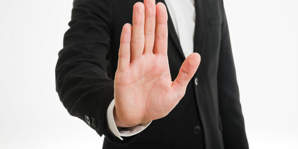 businessman-showing-palm-hand