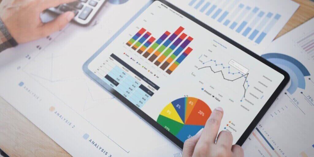 businesswoman-using-tablet-analysis-graph-company-finance-strategy-statistics-success-concept-planning-future-office-room