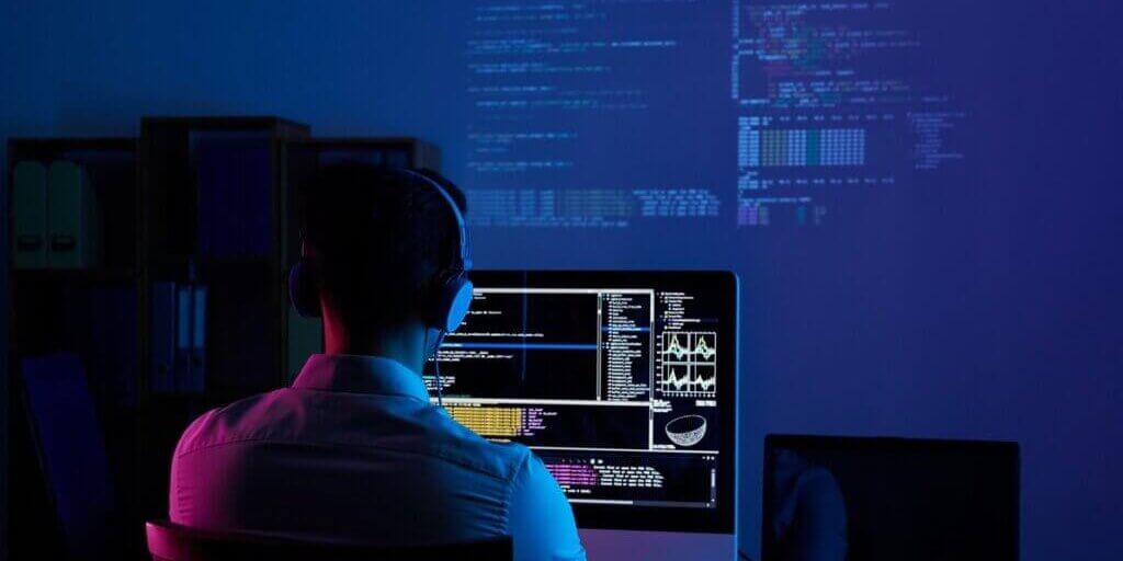 rear-view-programmer-working-all-night-long