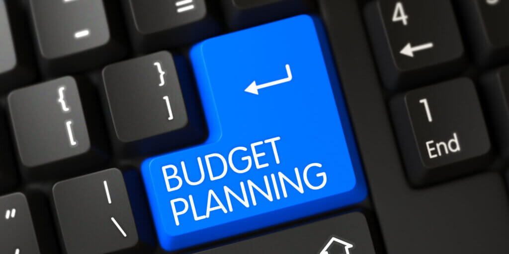 Stratix Systems Blue Budget Planning Button on Keyboard.