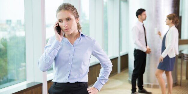businesswoman-talking-phone-office-7_1262-1458