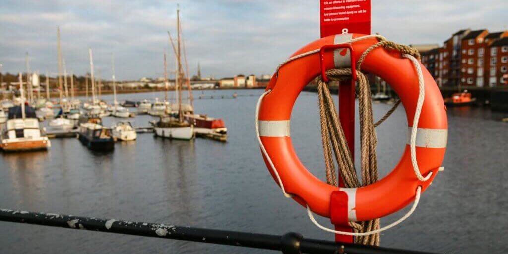 A selective focus shot of a lifebuoy ring in a sailboat with a blurred background
