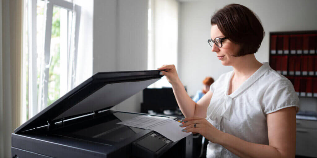 woman-working-office-using-printer (1)